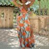 Women Floral Print Spaghetti Strap Sleeveless V Neck Backless Slit Hem Wholesale Maxi Dresses SDN580892